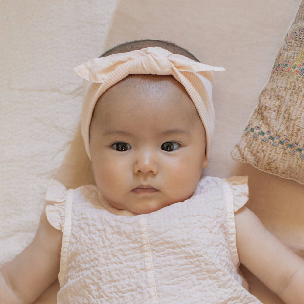 1 + in the family-Baby Girls Pastel Pink Cotton Bow Headband | Childrensalon
