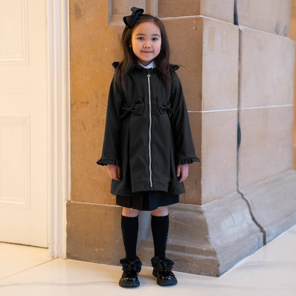 A Dee-Girls Black Raincoat with Ruffles & Bows | Childrensalon