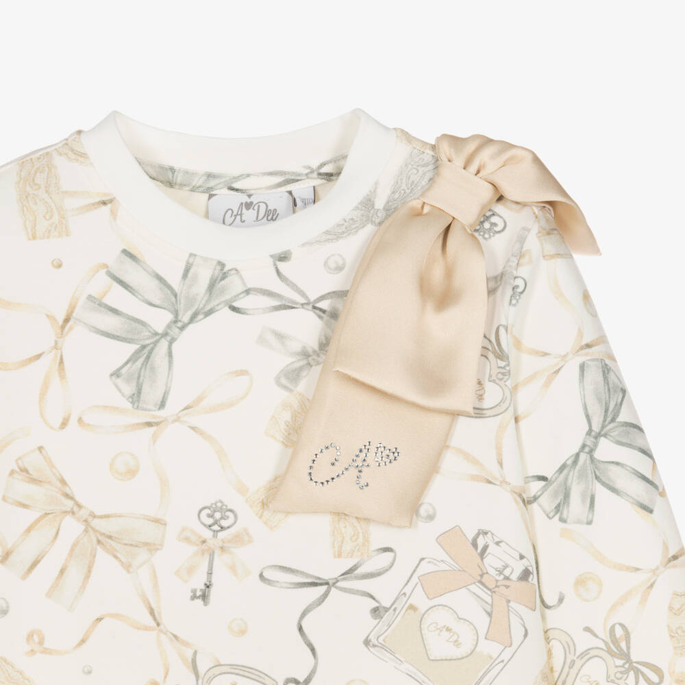 A Dee-Girls Ivory Perfume Bottle Print Cotton Jersey Dress | Childrensalon