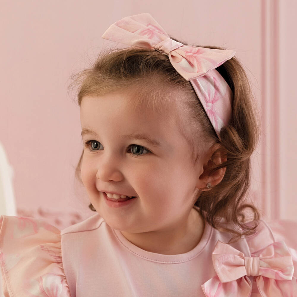 A Dee-طوق رأس بطبعة فيونكة لون زهري فاتح للبنات | Childrensalon