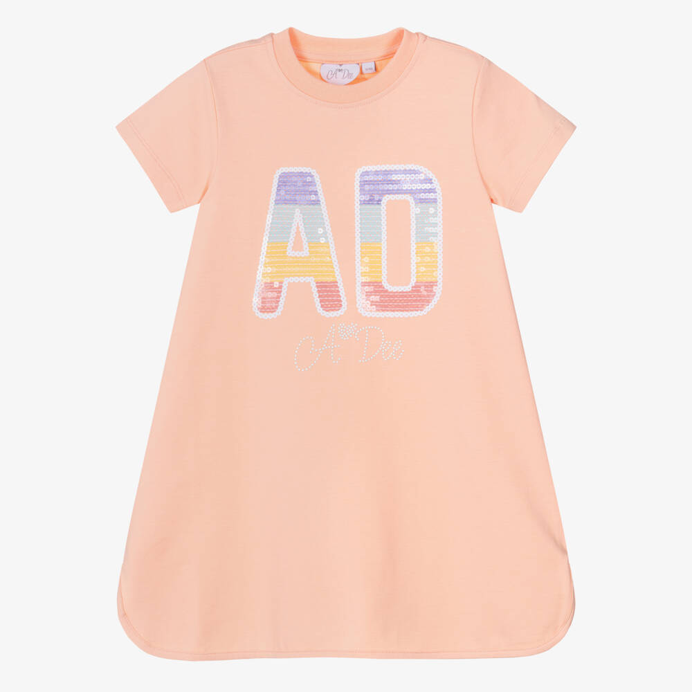 A Dee-Girls Peach Pink Cotton T-Shirt Dress with Sequin Logo | Childrensalon