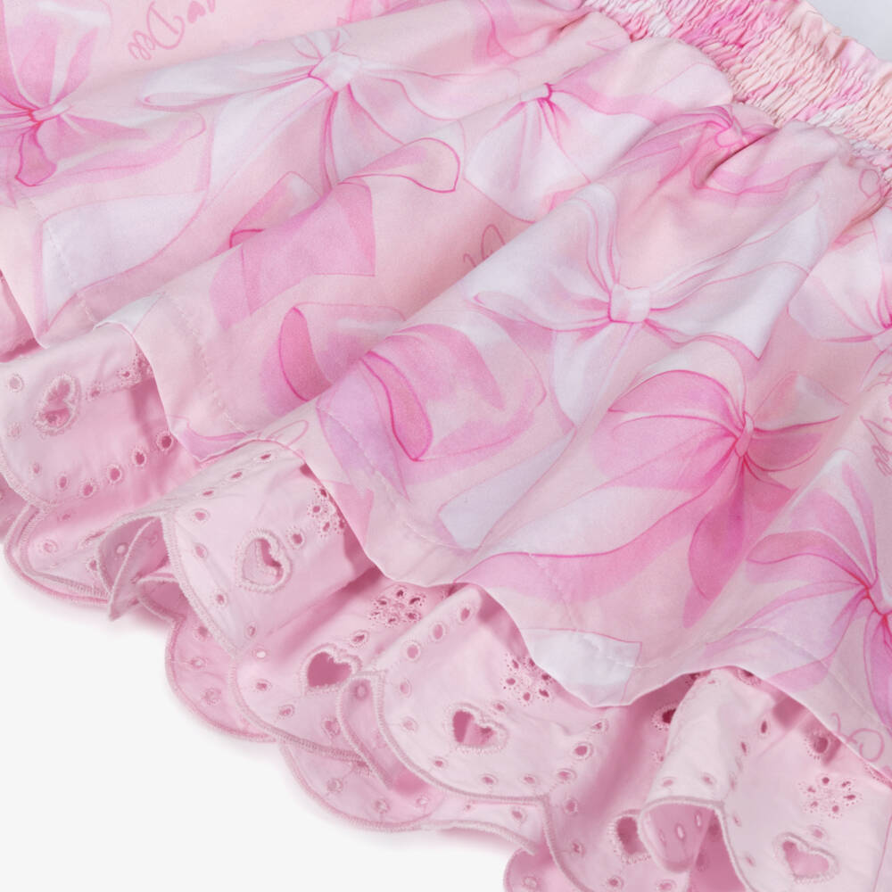 A Dee-Girls Pink Cotton Bow Dress with Broderie Anglaise Trims | Childrensalon