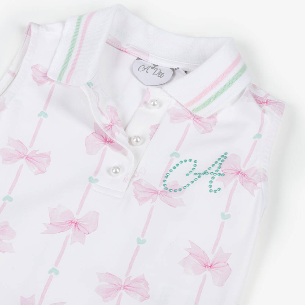A Dee-Girls White Cotton Tennis Style Dress with Pink Bows | Childrensalon