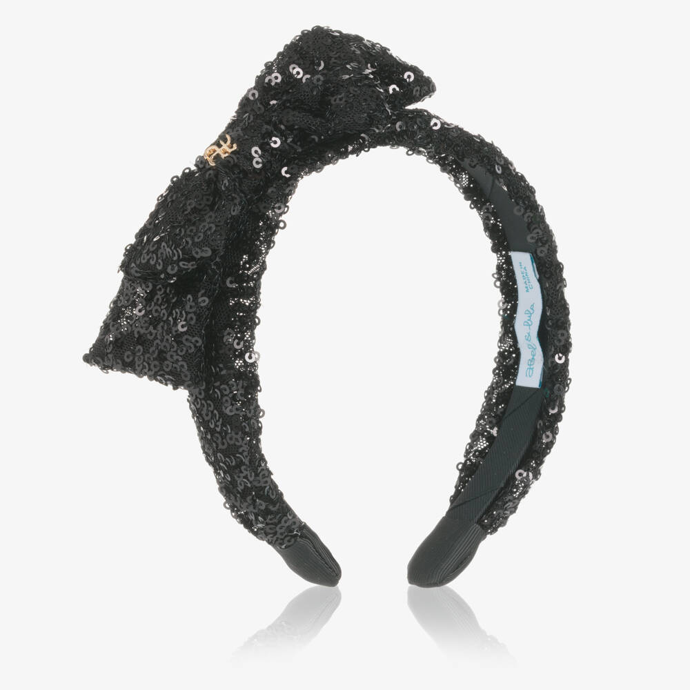 Abel & Lula-Girls Black Sequinned Tulle Bow Hairband with Logo Charm | Childrensalon