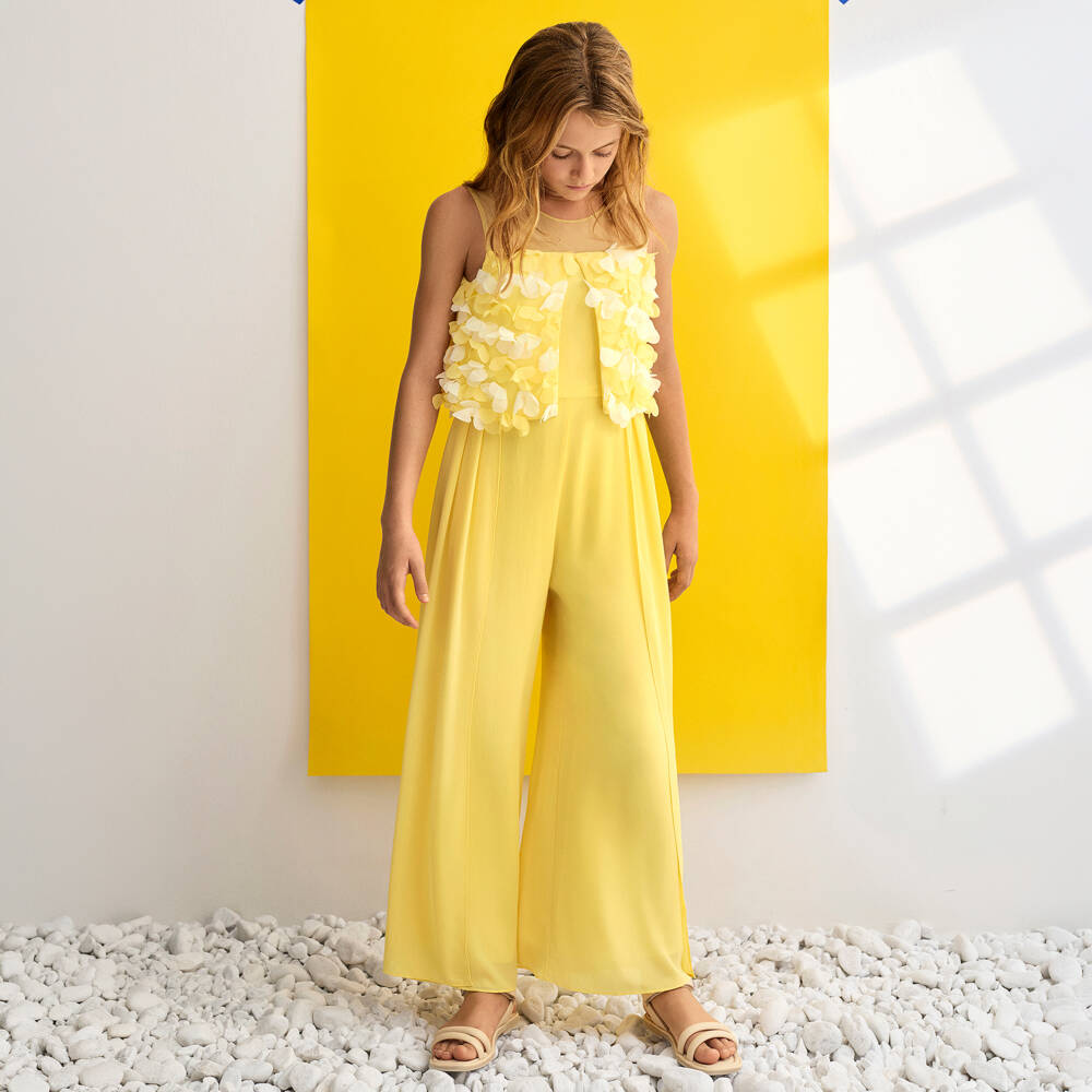 Abel & Lula-Girls Bright Yellow Crêpe Jumpsuit with Petal Appliqués | Childrensalon