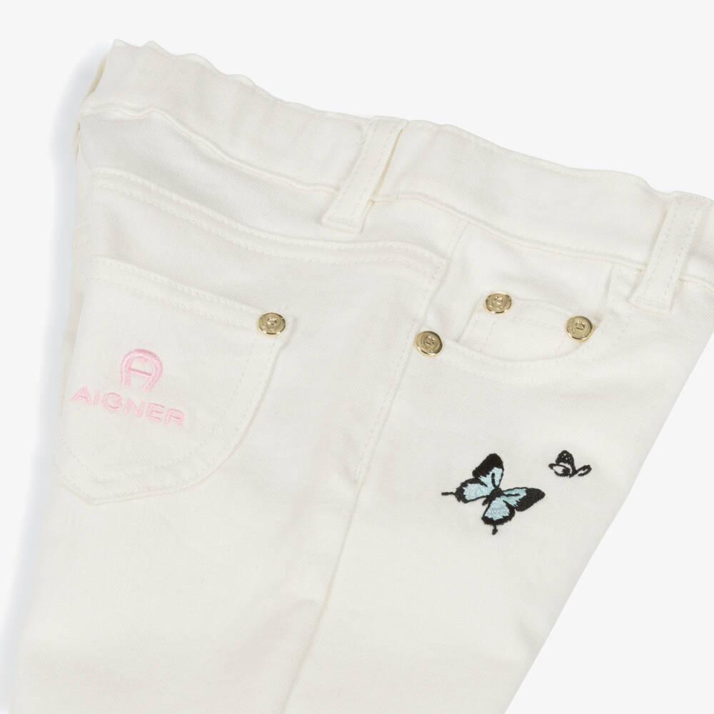 AIGNER-Baby Girls White Denim Jeans with Embroidered Butterflies | Childrensalon