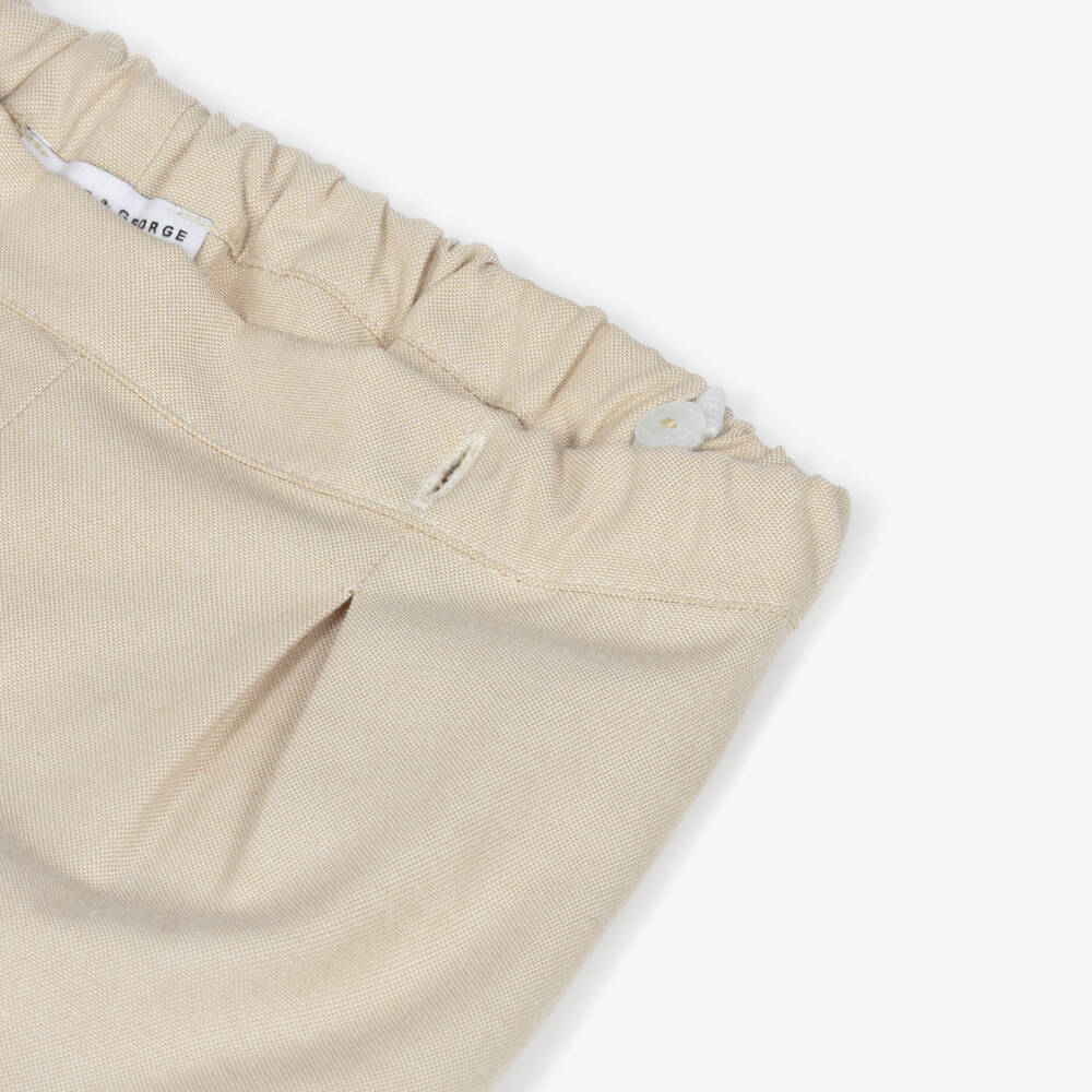 Beatrice & George-Boys Beige Hand-Smocked Cotton Buster Suit | Childrensalon