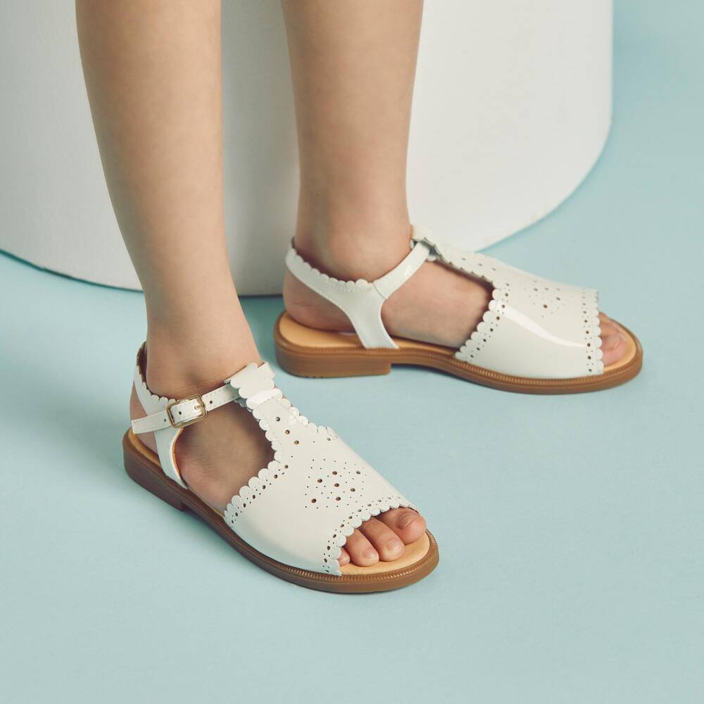 Beatrice & George-Girls White Patent Leather Sandals with Scalloped Detailing | Childrensalon
