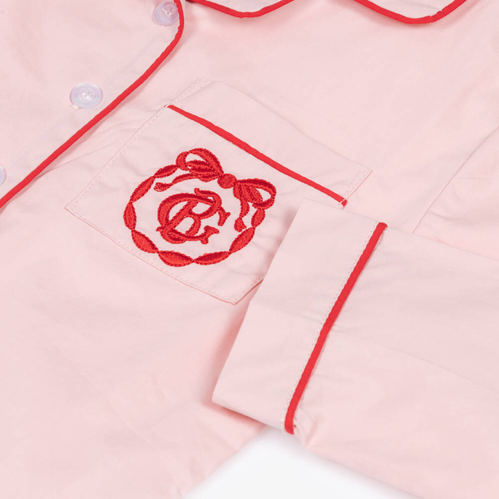 Beatrice & George-Pink Cotton Pyjamas with Red Piping | Childrensalon