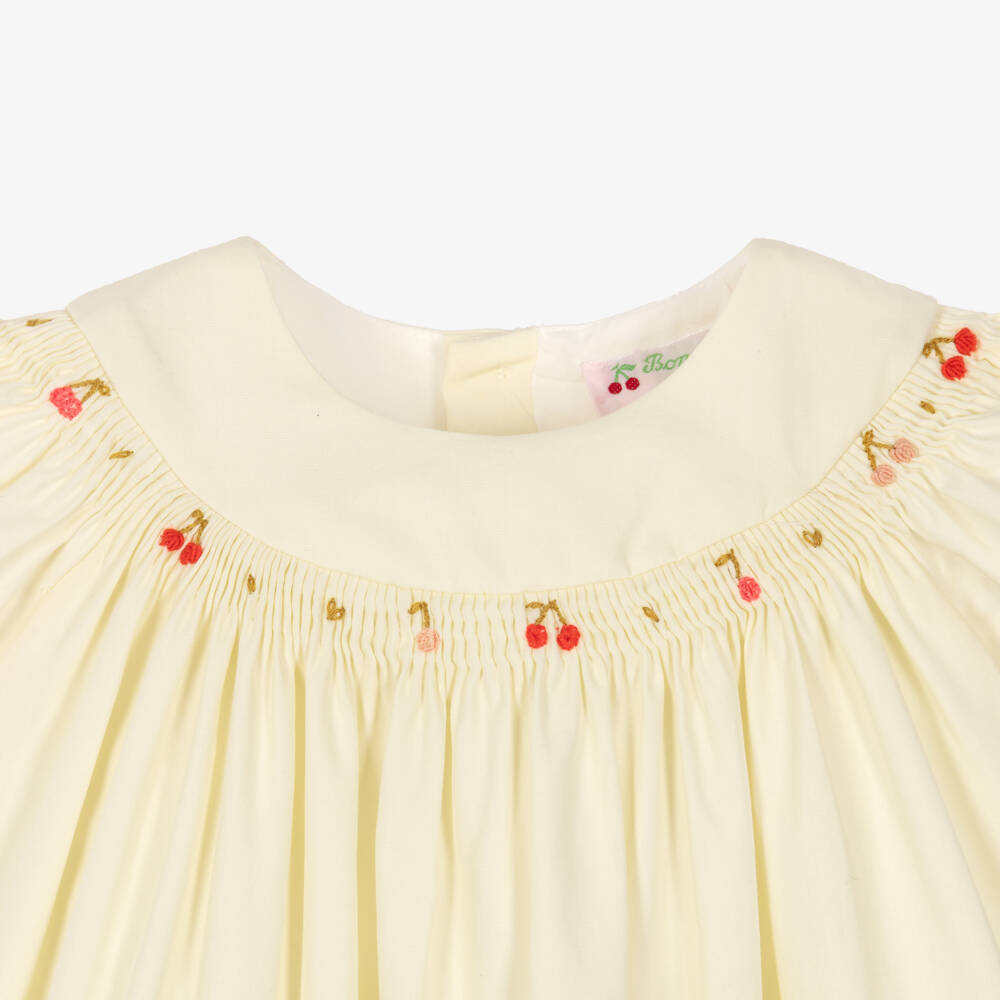 Bonpoint-Baby Girls Ivory Cotton Smocked Dress | Childrensalon
