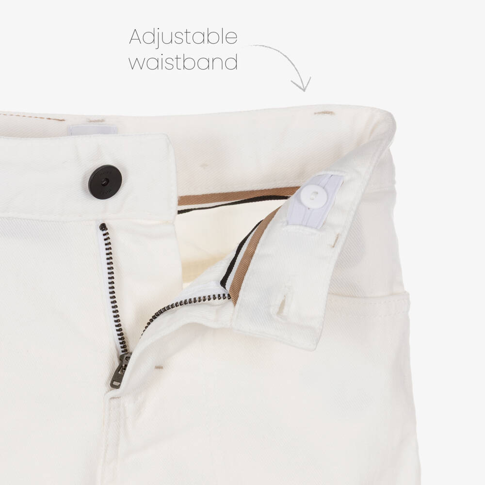 BOSS-Шорты кремовые из хлопкового денима для мальчиков | Childrensalon