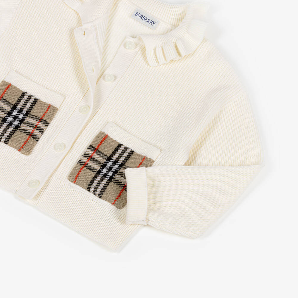 Burberry-Кардиган кремовый из хлопка и шерсти с клетчатыми карманами для девочек | Childrensalon