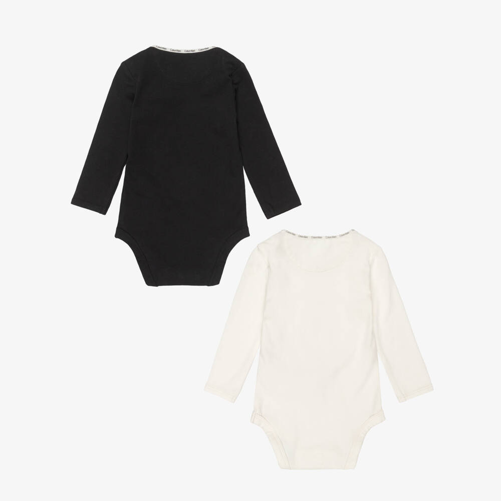 Calvin Klein-طقم بودي سوت ومريلة قطن لون أسود وأبيض | Childrensalon