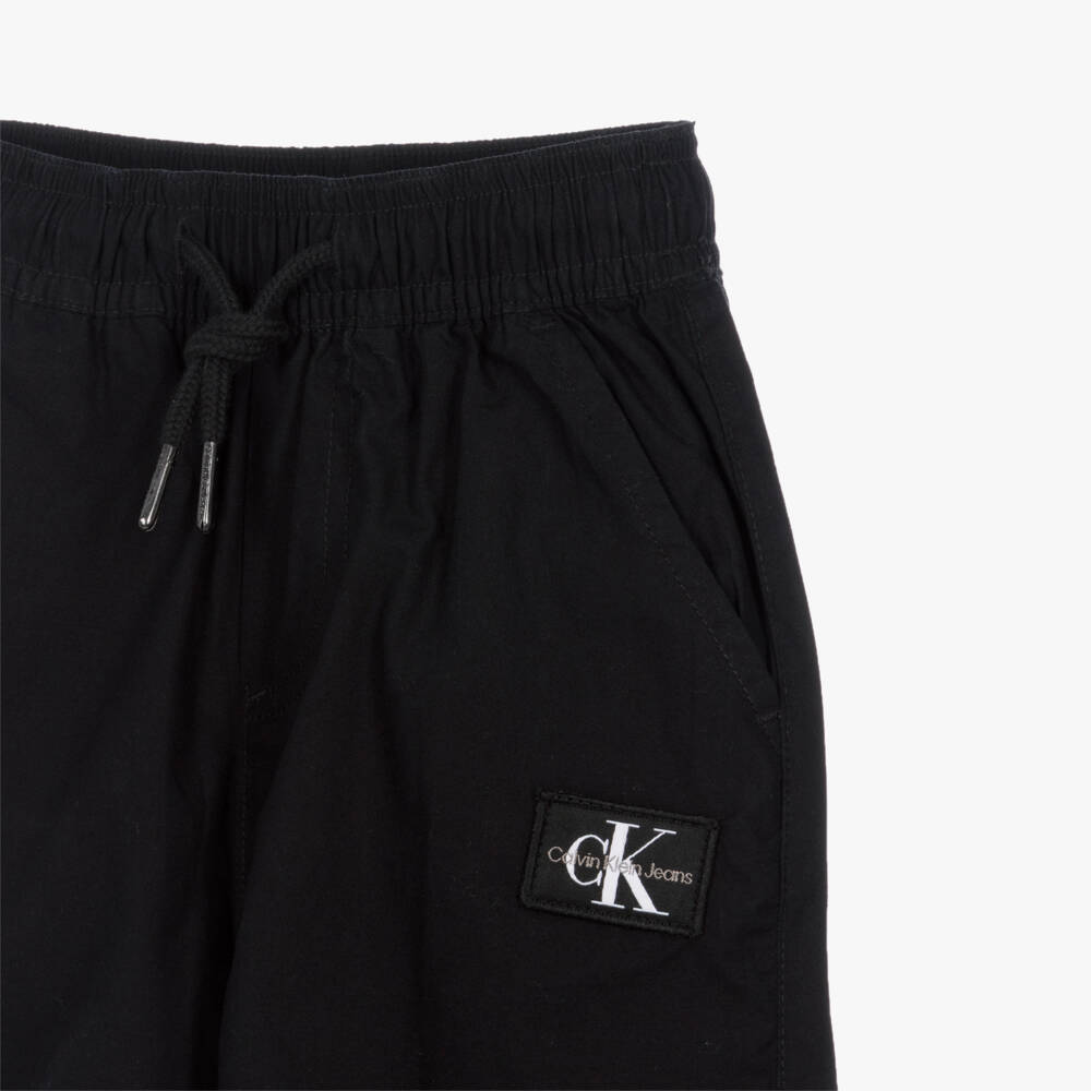 Calvin Klein-Boys Black Cotton Parachute Trousers | Childrensalon
