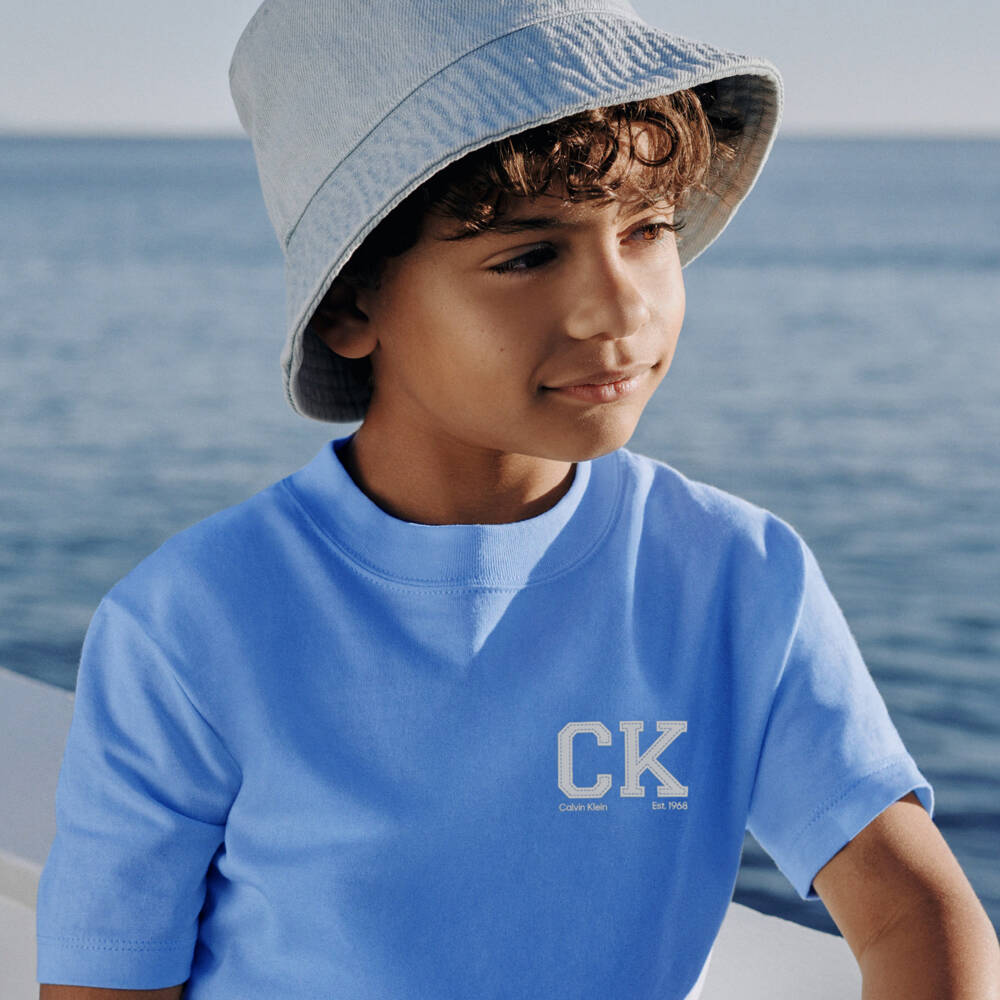 Calvin Klein-Boys Blue Cotton T-Shirt with CK Monogram Print | Childrensalon