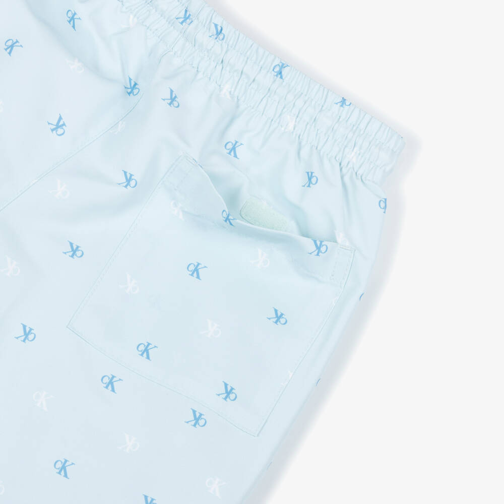 Calvin Klein-Boys Pale Blue CK Monogram Logo Print Swim Shorts | Childrensalon