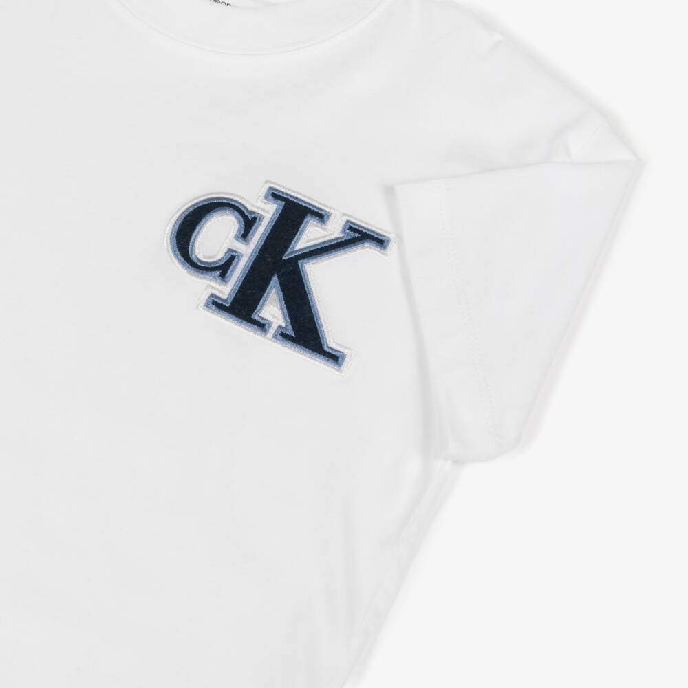 Calvin Klein-Boys White Cotton T-Shirt with Blue CK Monogram | Childrensalon