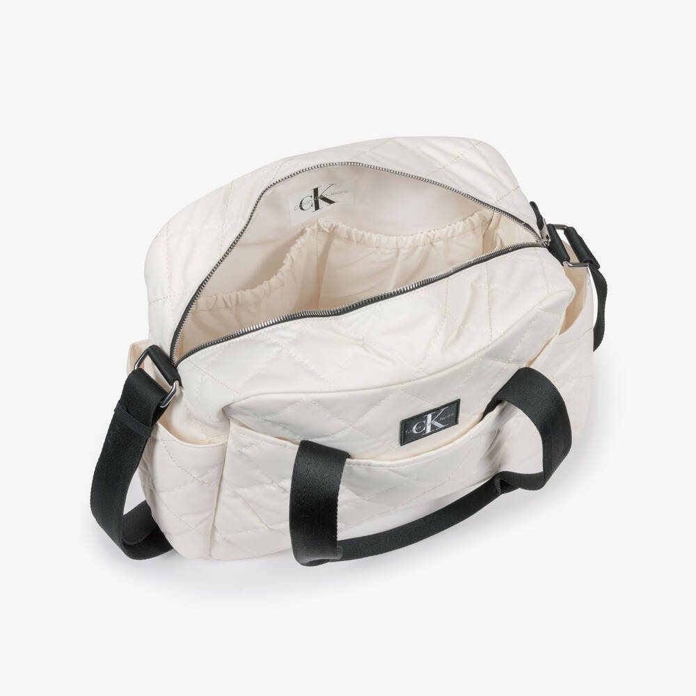 Calvin Klein-Cream Soft-Quilted Baby Changing Bag (32cm) | Childrensalon