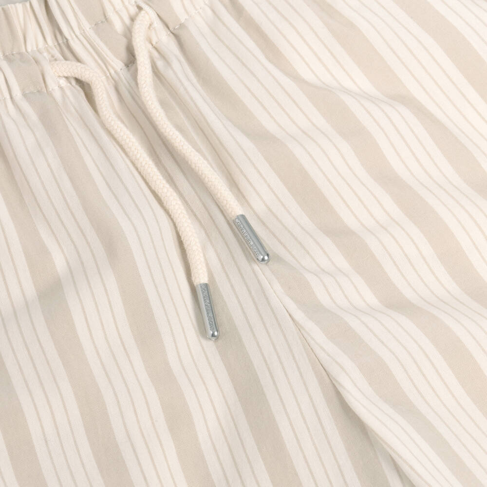 Calvin Klein-Girls Beige Striped Cotton Trousers | Childrensalon