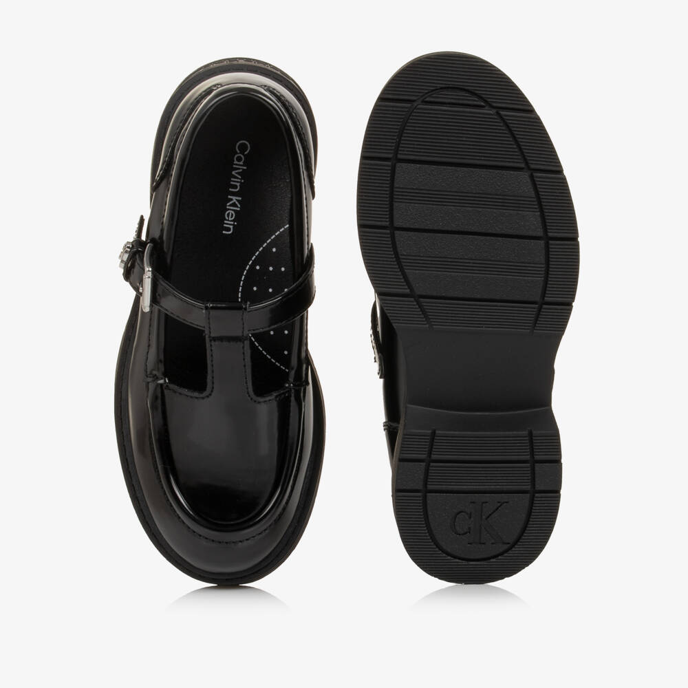 Calvin Klein-Girls Glossy Black T-Bar Buckle Shoes | Childrensalon