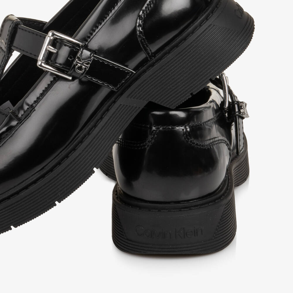 Calvin Klein-Girls Glossy Black T-Bar Buckle Shoes | Childrensalon