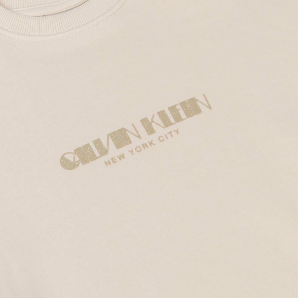 Calvin Klein-Girls Ivory Cotton Sweatshirt Dress with Iridescent Logo | Childrensalon