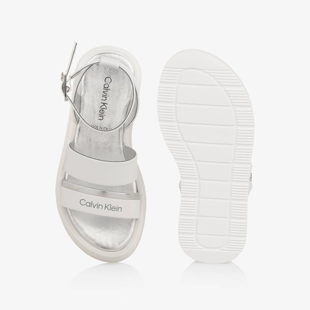 Calvin Klein-Girls White Faux Leather Sandals with Silver Trims | Childrensalon