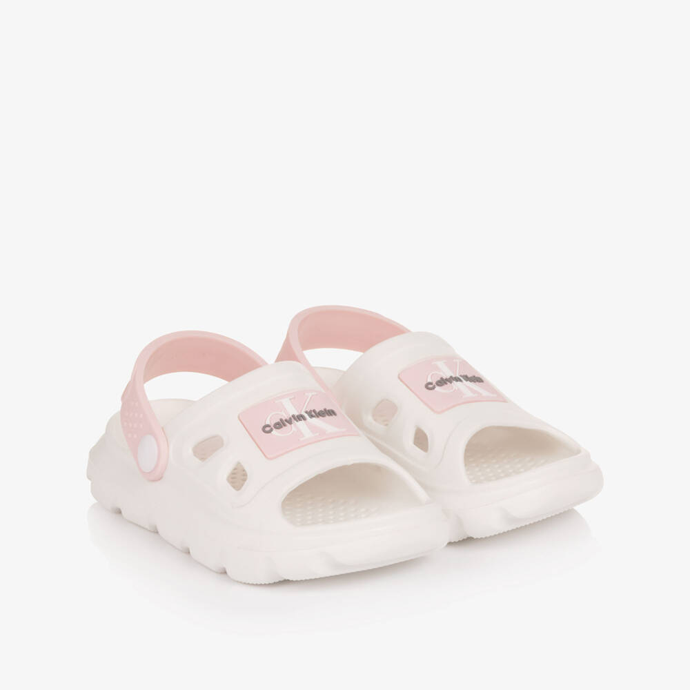 Calvin Klein-Girls White & Pink Logo Slider Sandals | Childrensalon