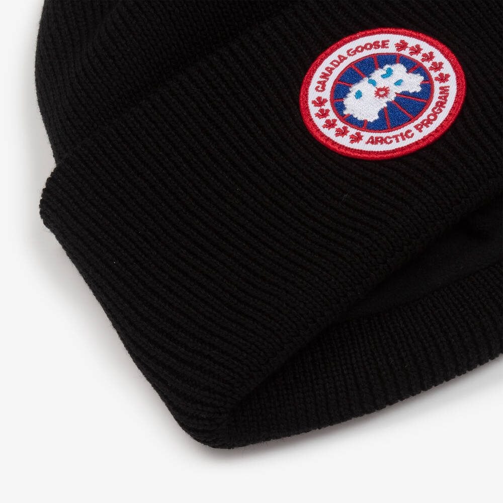 Canada Goose-قبعة بيني صوف مارينو محبوك لون أسود | Childrensalon