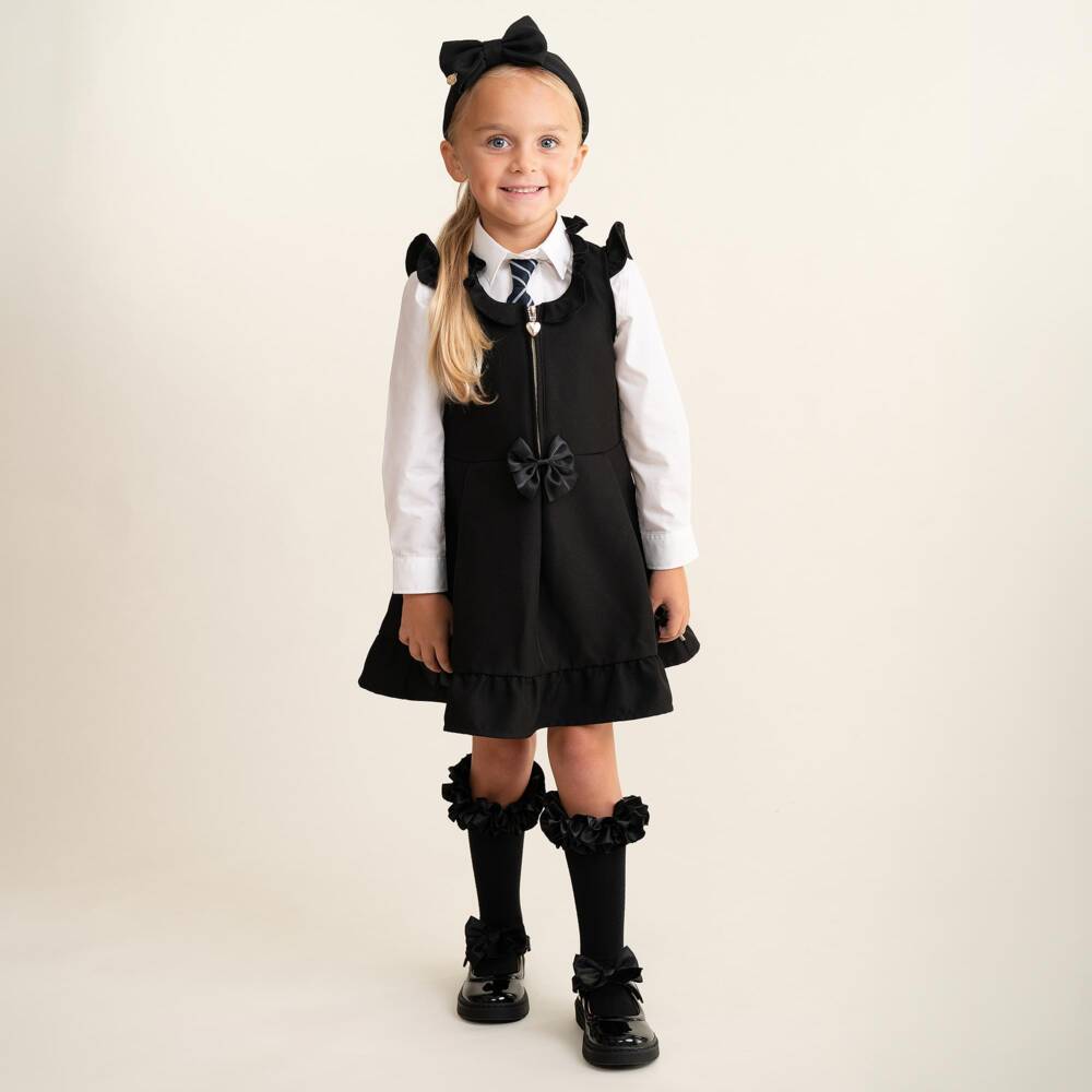 Caramelo Kids-Girls Black School Pinafore Dress with Bows | Childrensalon