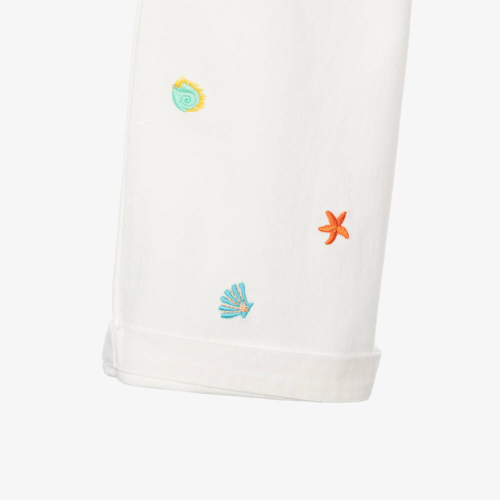 Catimini-Girls White Denim Wide-Leg Jeans with Embroidered Seashells | Childrensalon