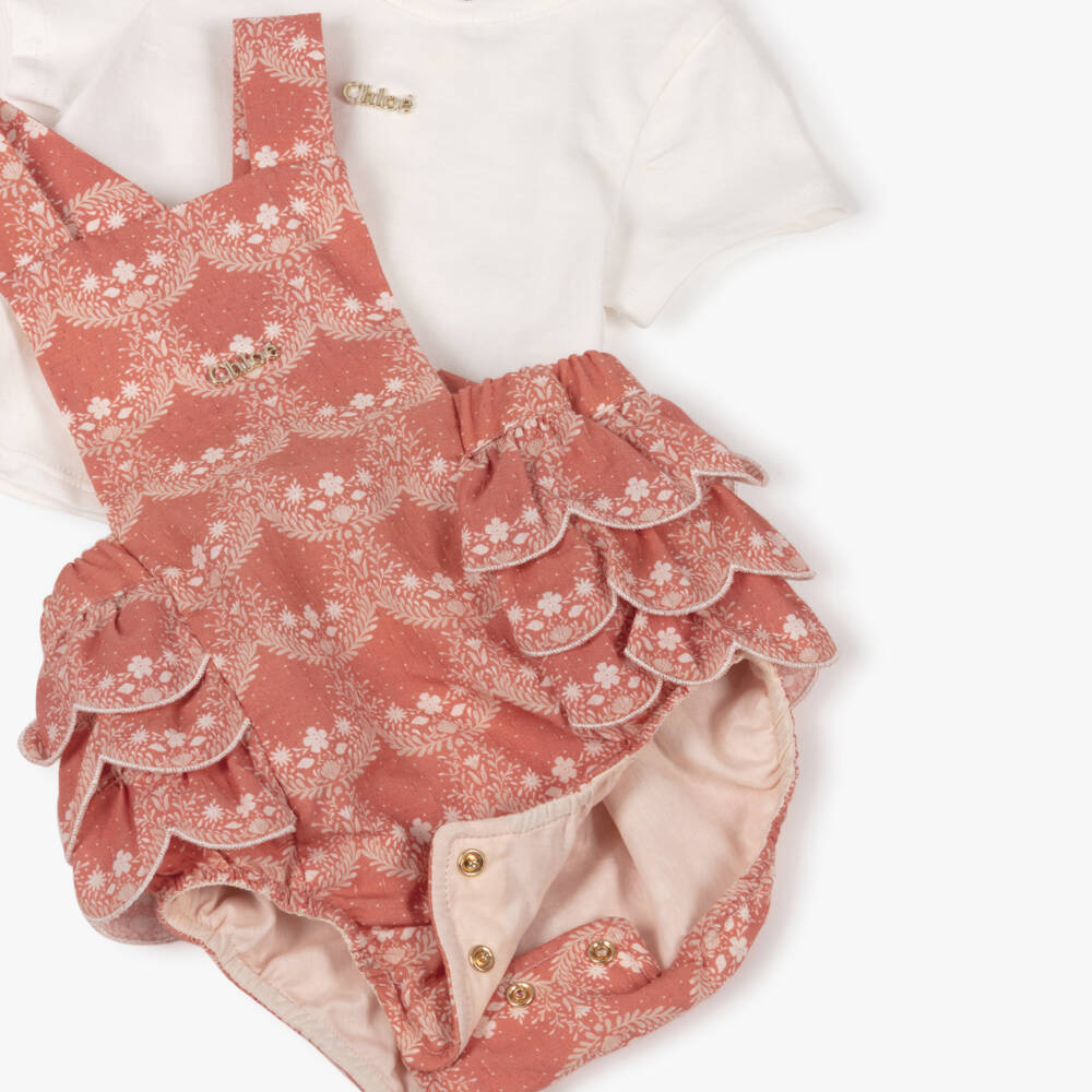 Chloé-Baby Girls Pink & White Floral Print Dungaree Shorts Set | Childrensalon