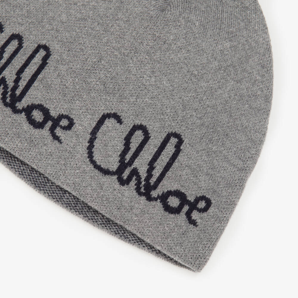 Chloé-Girls Grey Knitted Hat with Navy Blue Chloé Logo | Childrensalon