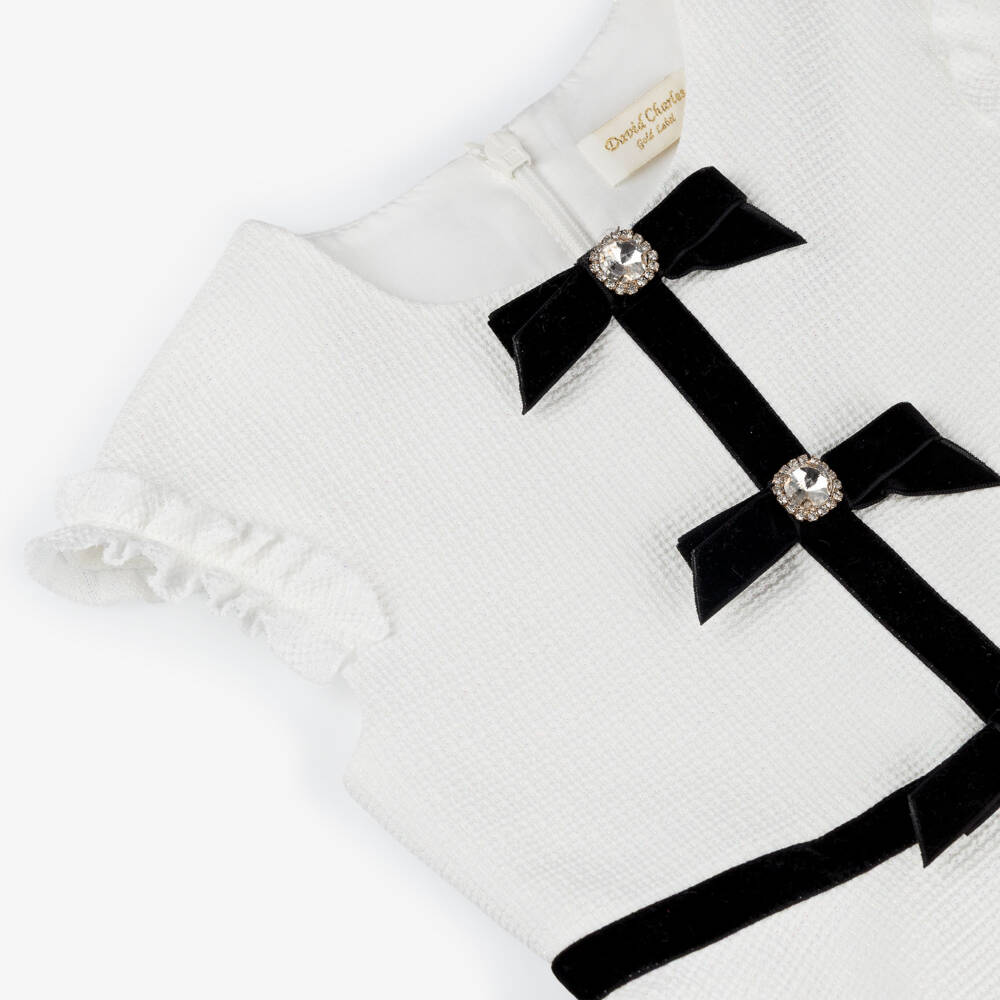 David Charles-Платье кремовое с черными бархатными бантами для девочек | Childrensalon