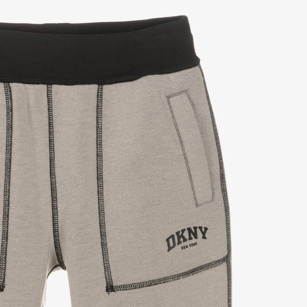 DKNY-Boys Beige & Black Reversible Joggers | Childrensalon