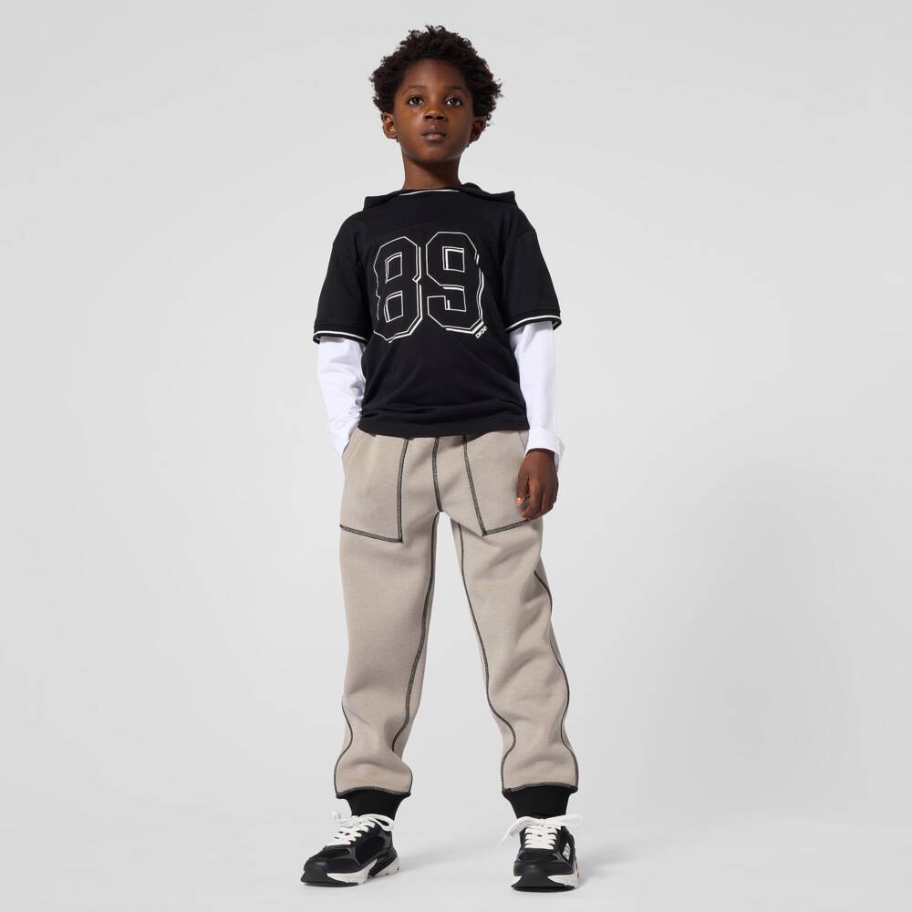 DKNY-Boys Beige & Black Reversible Joggers | Childrensalon