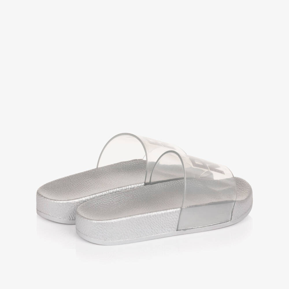 DKNY-Girls Silver Sliders with Transparent Logo Strap | Childrensalon