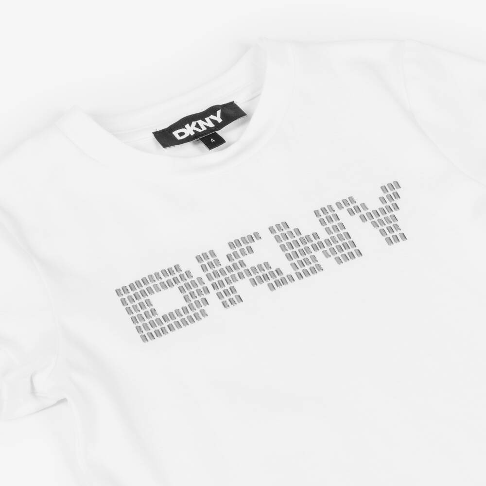 DKNY-تيشيرت قطن بشعار مرصع لون أبيض للبنات | Childrensalon