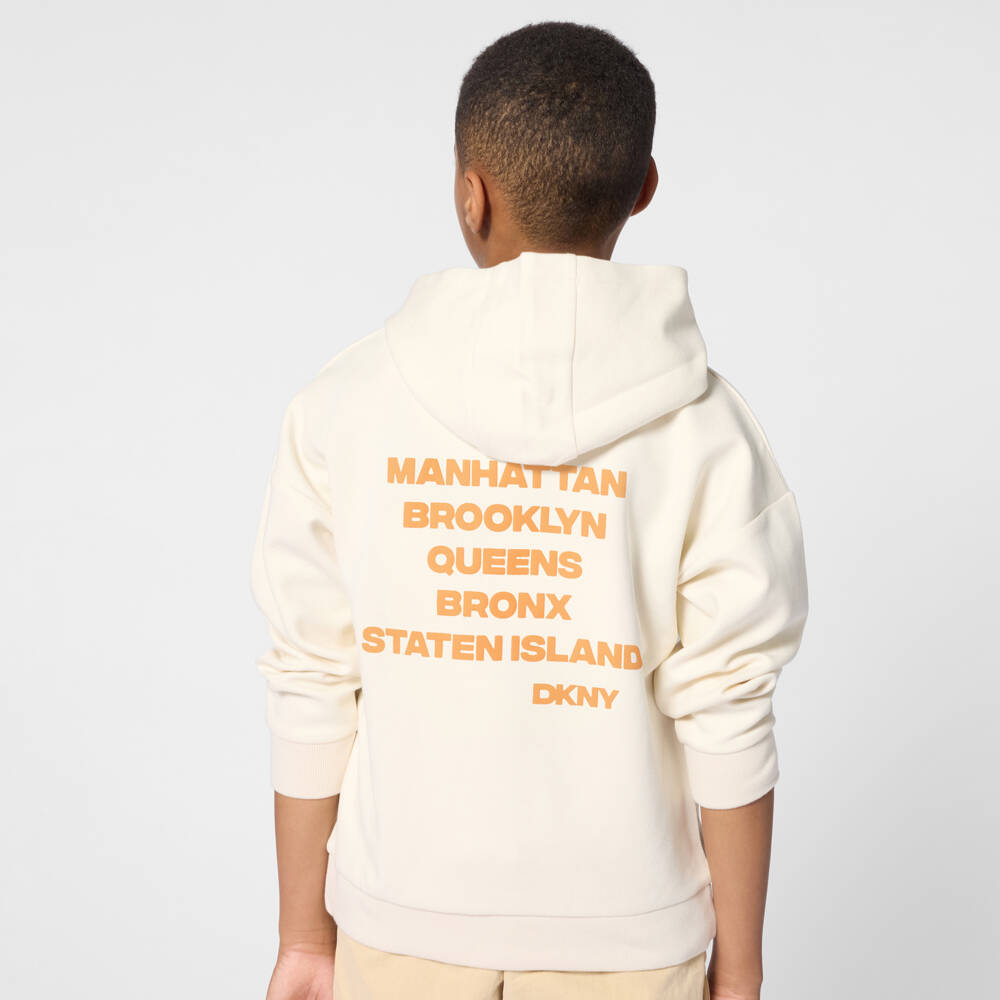 DKNY-Ivory Hoodie with Orange NY Boroughs Print | Childrensalon