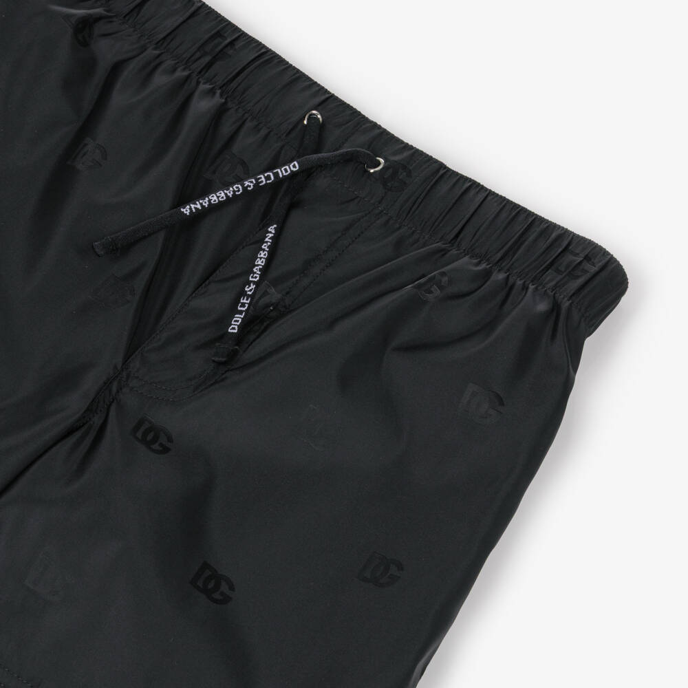 Dolce & Gabbana-Boys Black DG Logo Patterned Swim Shorts | Childrensalon