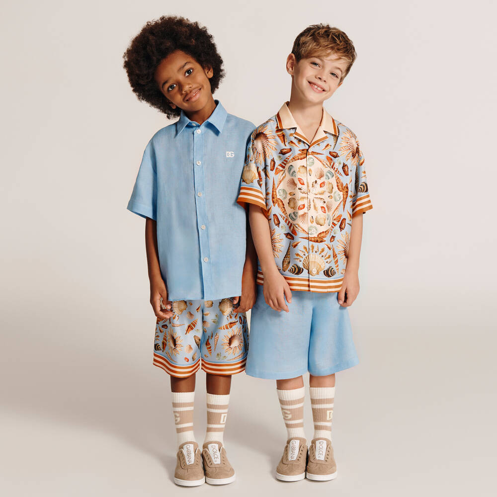 Dolce & Gabbana-Шорты из шелка голубые с рисунком ракушек для мальчиков | Childrensalon