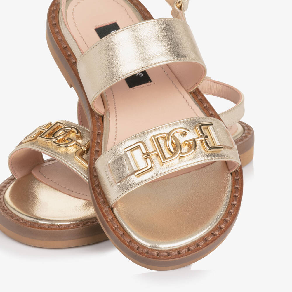 Dolce & Gabbana-Girls Gold Leather Sandals with DG Crossed Logo | Childrensalon