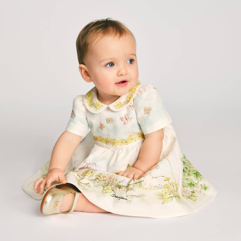 Dolce & Gabbana-Girls Ivory Cotton Dress with Storybook Print | Childrensalon