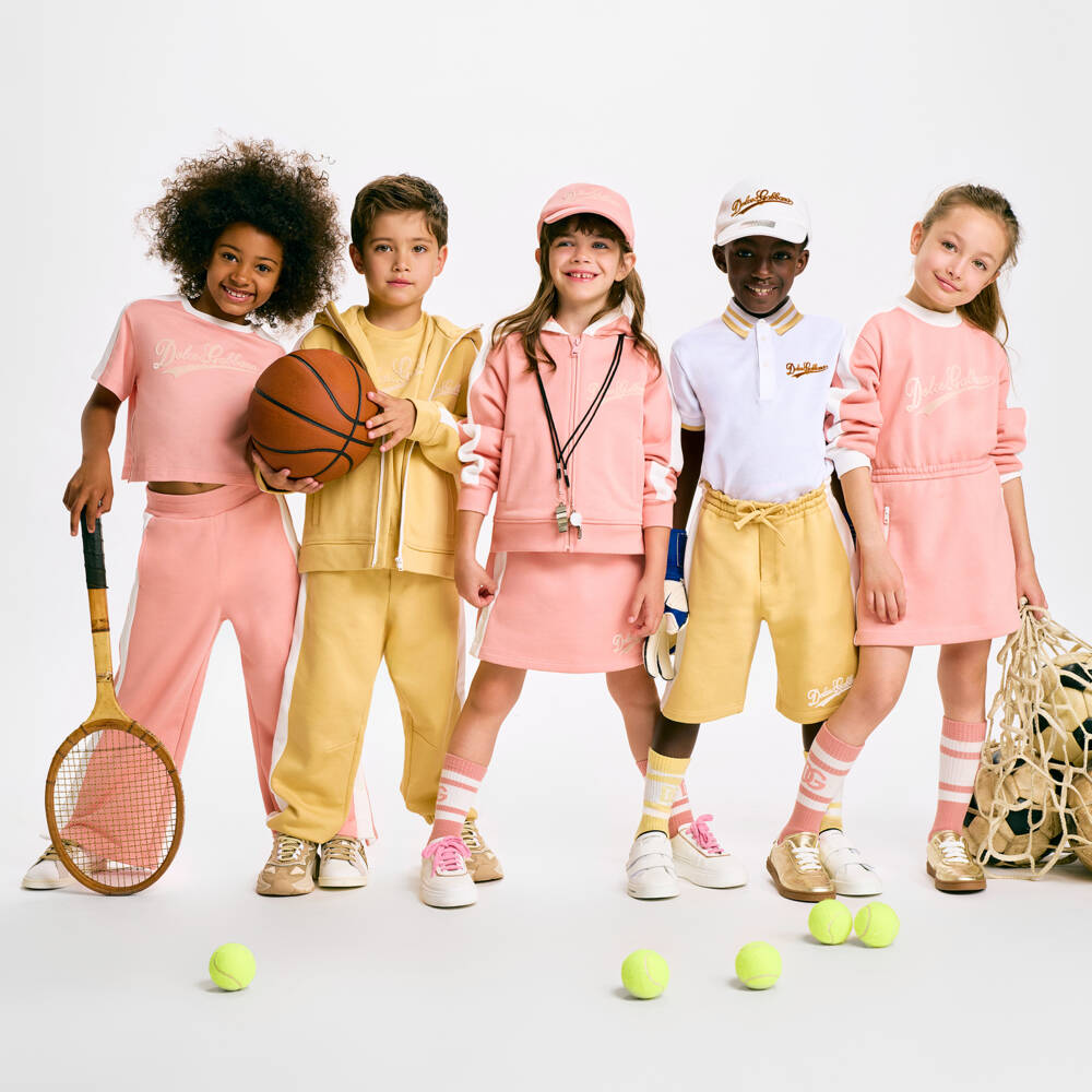 Dolce & Gabbana-Girls Pink Cotton Jersey Skirt with White Side Trim | Childrensalon