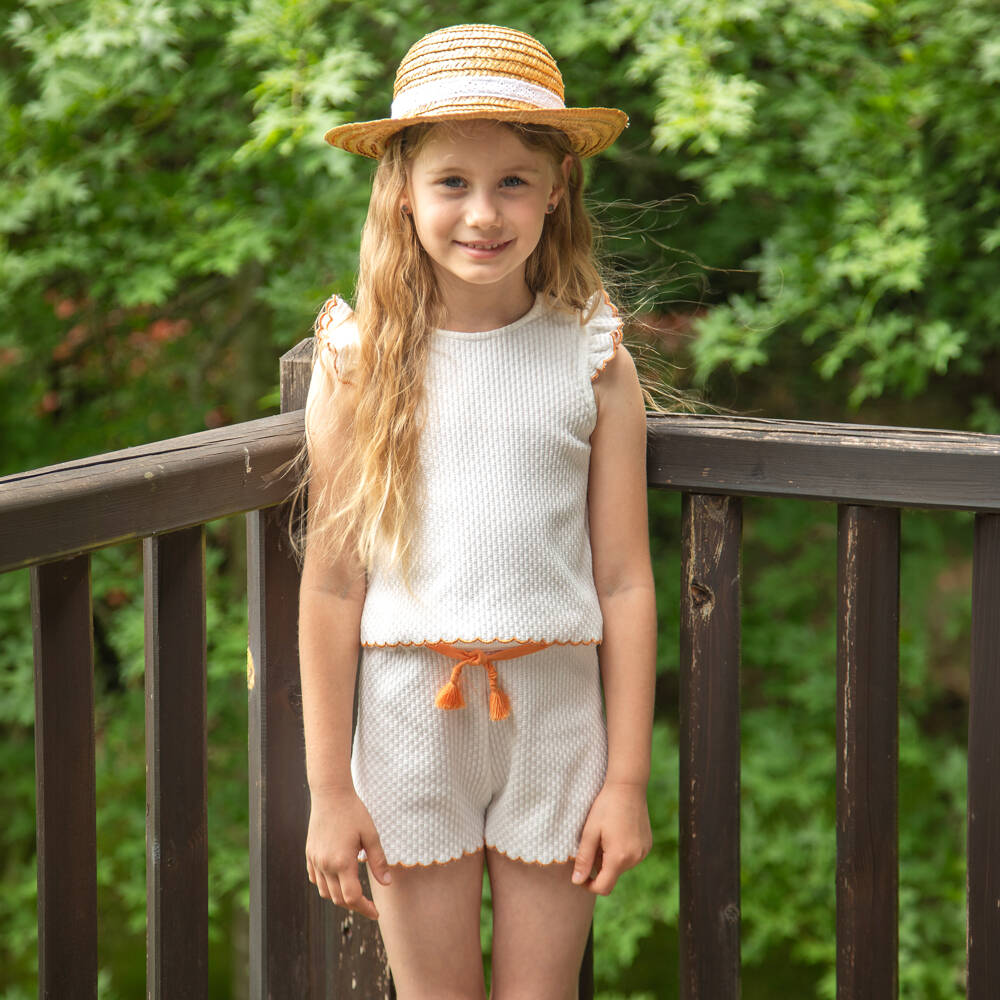 Dr. Kid-Girls Ivory Cotton Knit Shorts with Orange Tassel Belt | Childrensalon