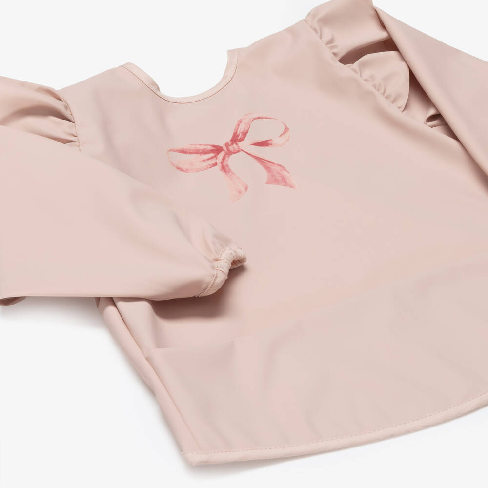 Elodie-Baby Girls Pink Apron Bib with Bow Print | Childrensalon