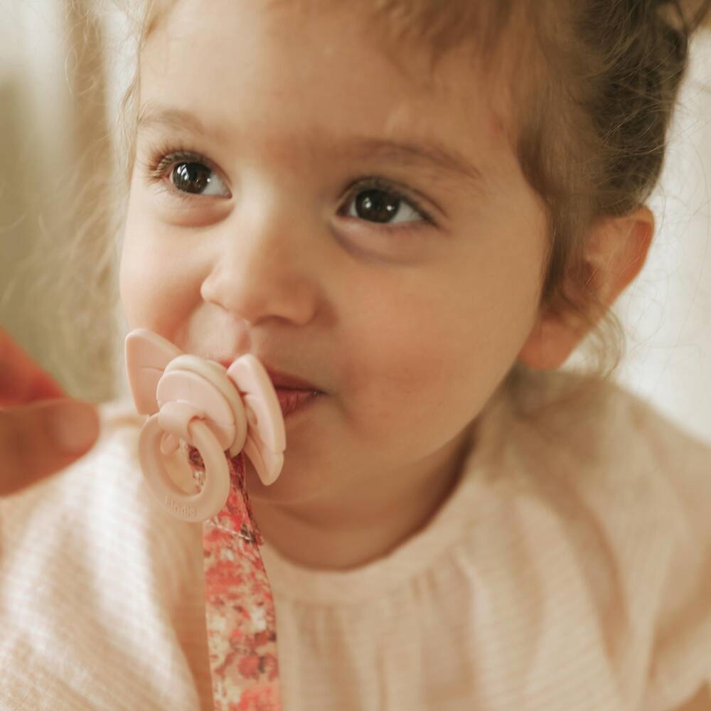 Elodie-Baby Girls Pink River Rose Print Dummy Clip | Childrensalon