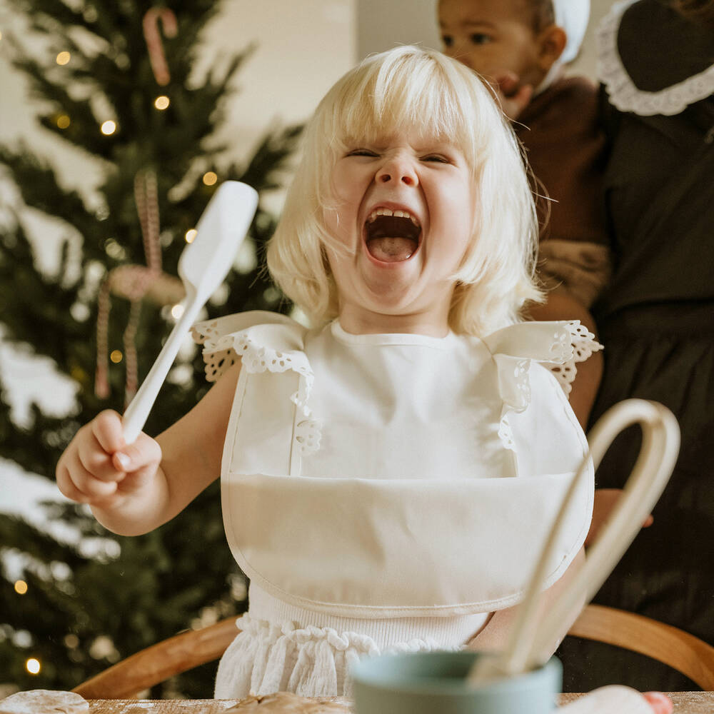 Elodie-Ivory Ruffle Baby Bib | Childrensalon