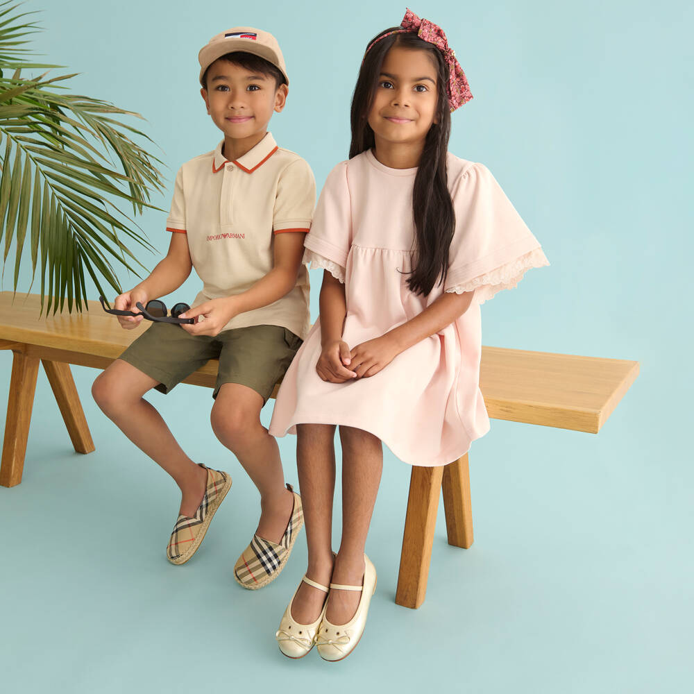 Emporio Armani-قميص بولو بشعار الماركة قطن لون برتقالي وبيج للأولاد | Childrensalon