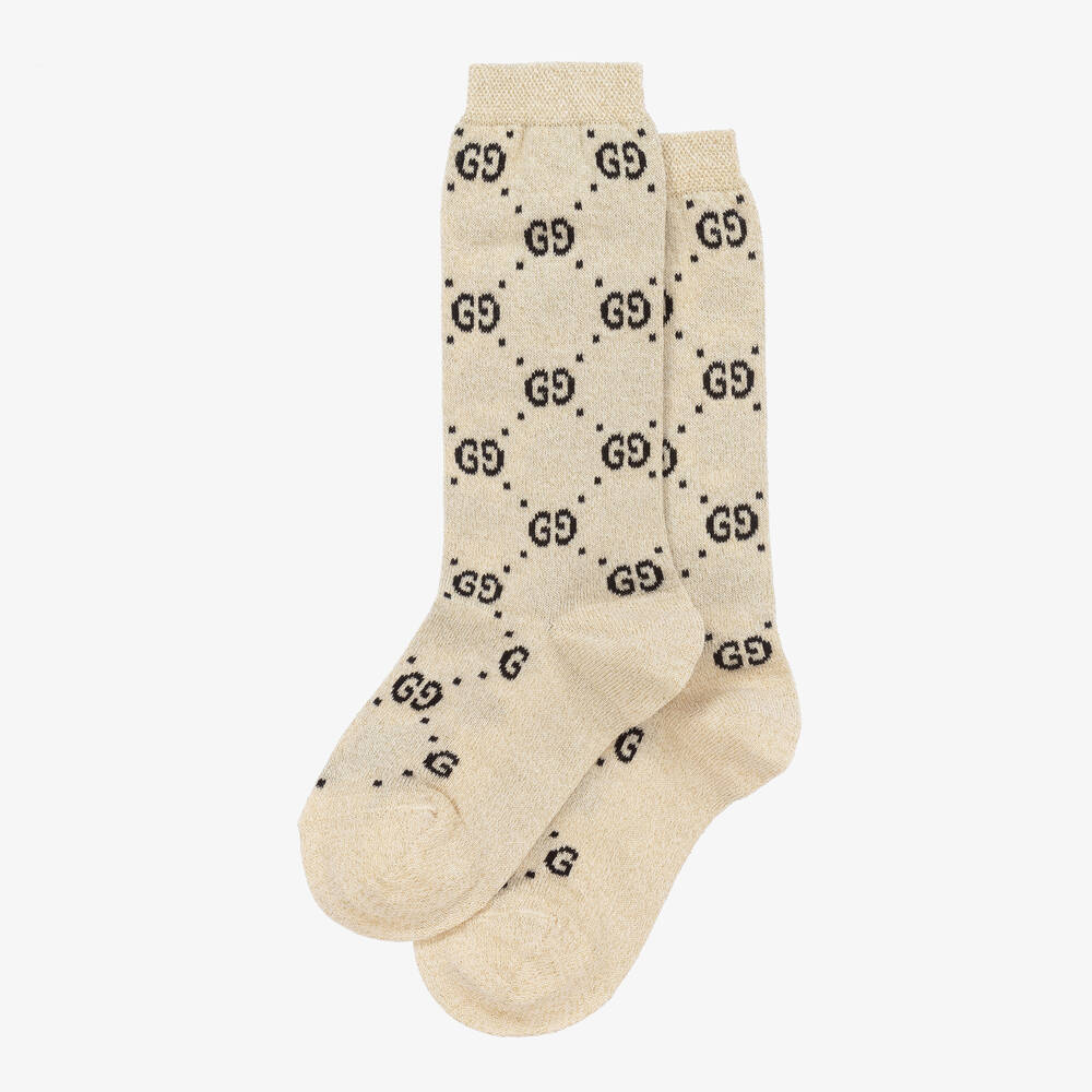 Gucci-جوارب بشعار GG لون عاجي براق | Childrensalon
